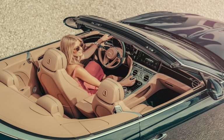 A roadtrip in Spain, but make the car a Bentley GT Convertible